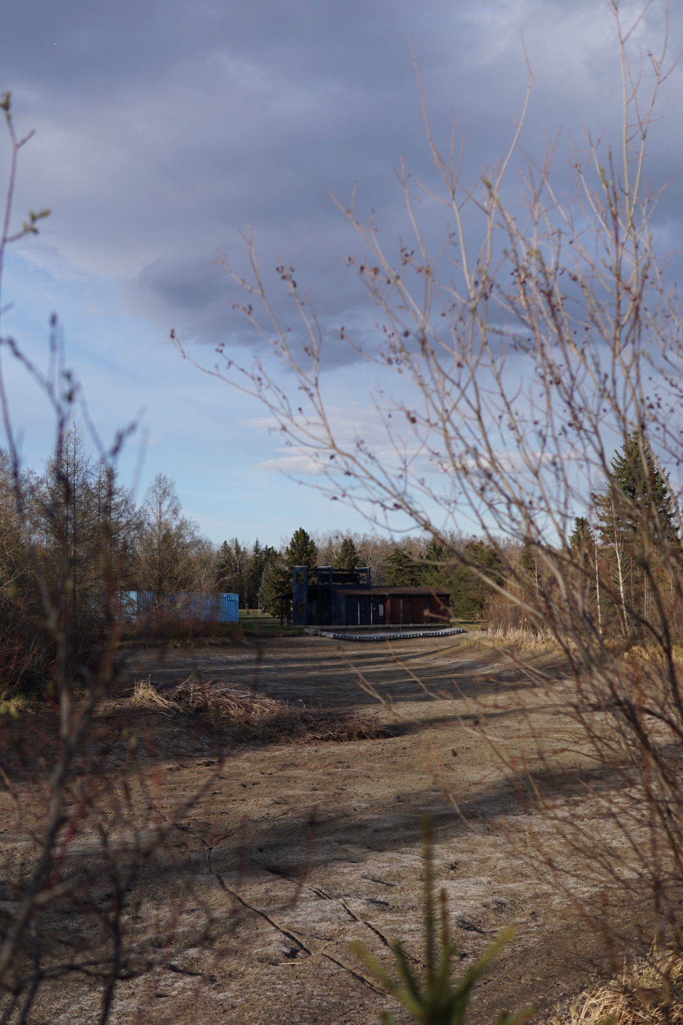 Low-light portrait with screen glow framing the subject