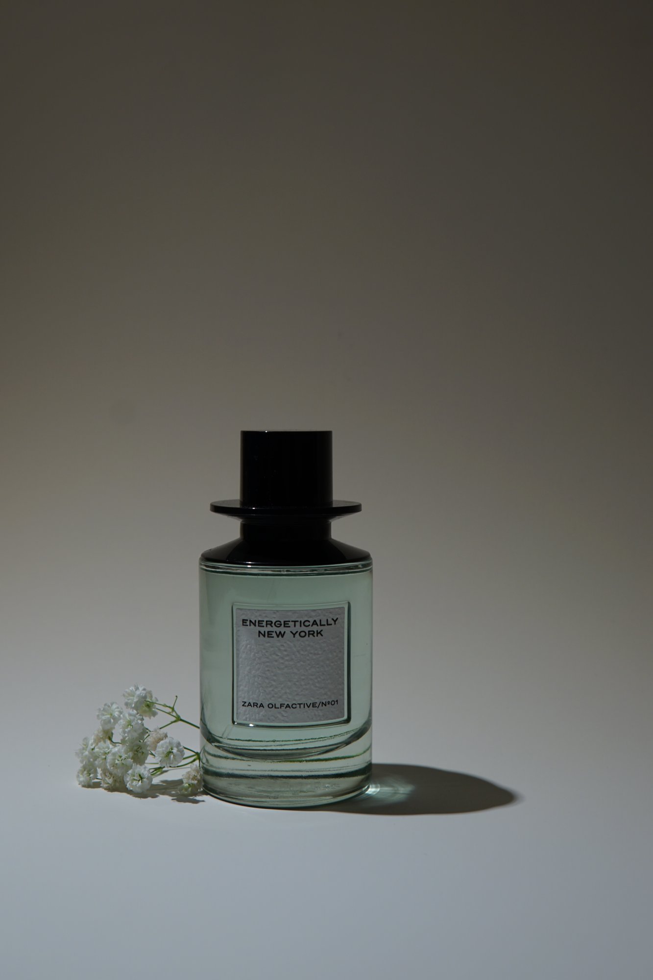 Perfume bottle still life with dried flowers